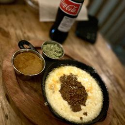 Clavel signature dishes Queso Fundido, Barbacoa, Quesadilla, Cochinita Pibil, Huitlacoche, Lengua